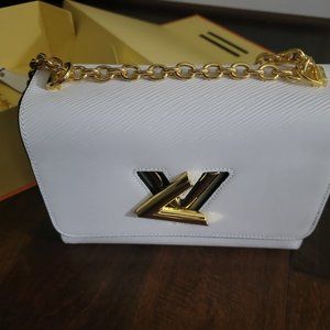 A beautiful white bag with a twist lock mechanism